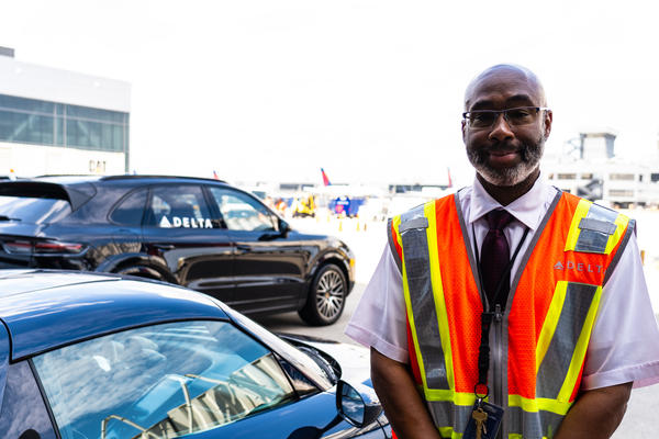 Delta Elite Services Agent Anthony Grant prepares to escort connecting customers at Hartsfield-Jackson Atlanta International Airport.
