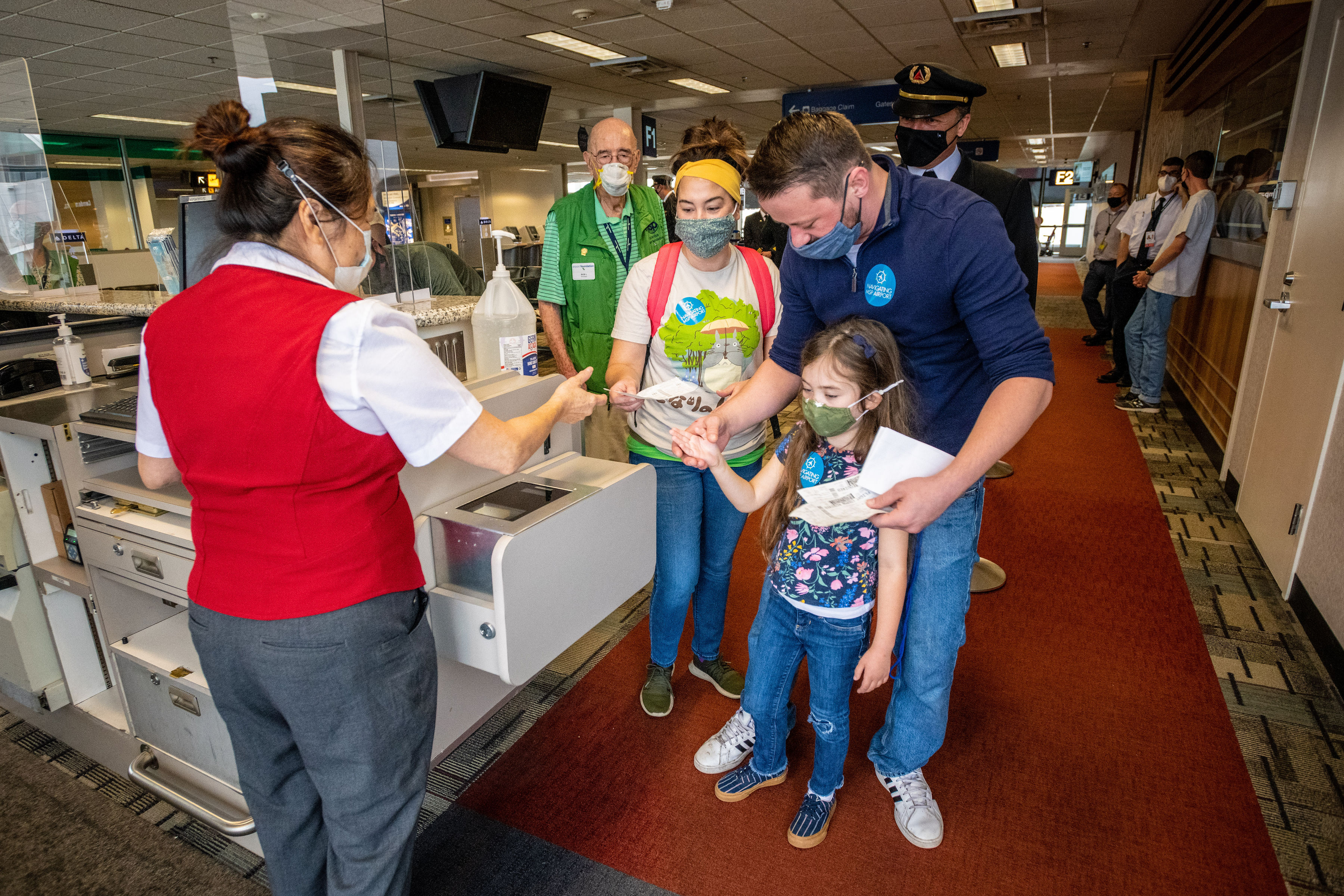 Customers and their children get the opportunity to practice the ticketing process during the Navigating MSP program.