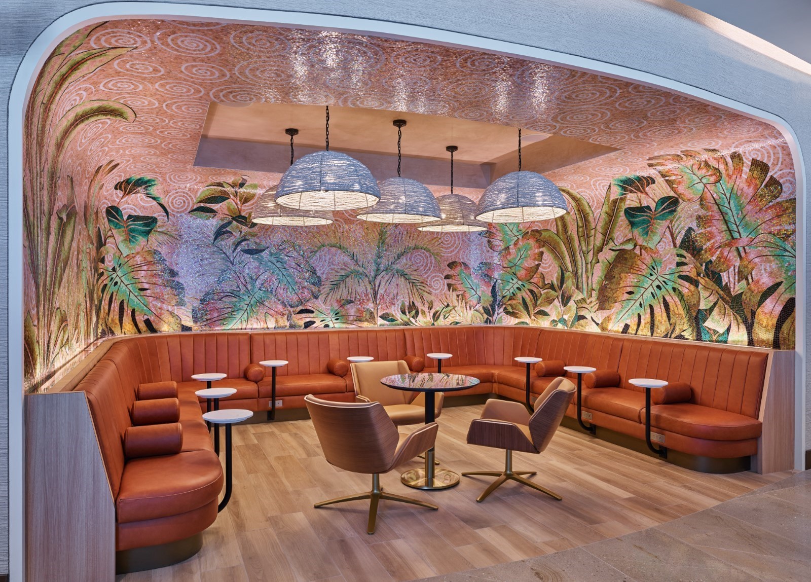 The LAX Sky Club's Coffee Grotto is a nook that offers a glamorous glimpse of Hollywood's Golden Age ambiance with an exquisite mosaic mural featuring glass tiles imported from Italy.