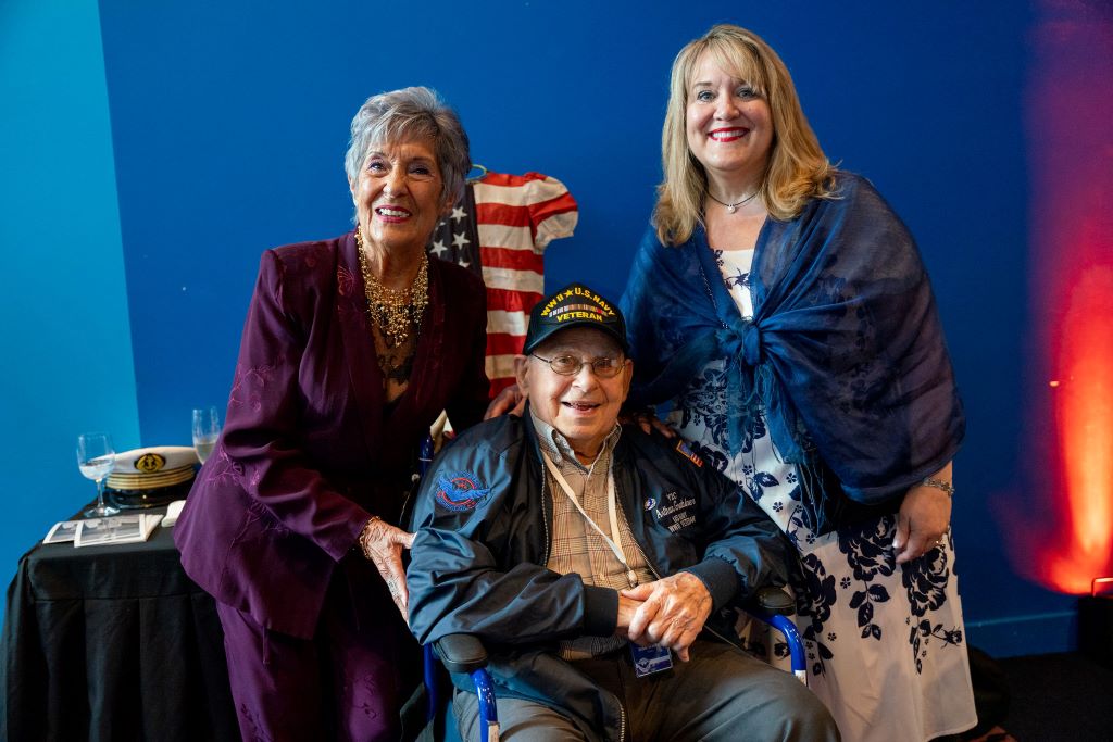 Pictured from left to right: Dany Patrix Boucherie, WWII veteran Arthur Grabiner, Christian Taylor