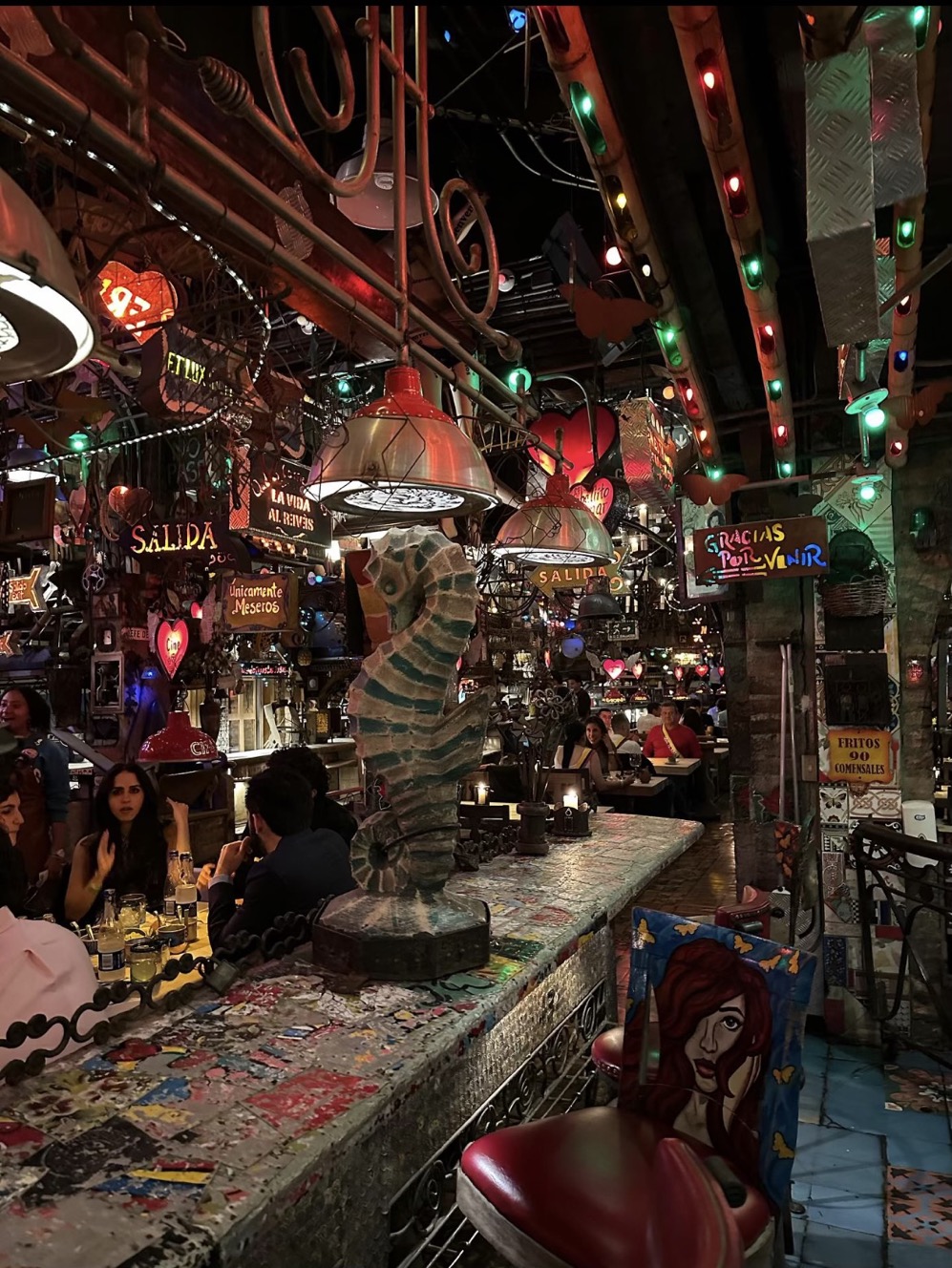 The inside of Andres Carne de Res in Bogota, Colombia, a steakhouse that serves Colombian classics and is a lively club at night