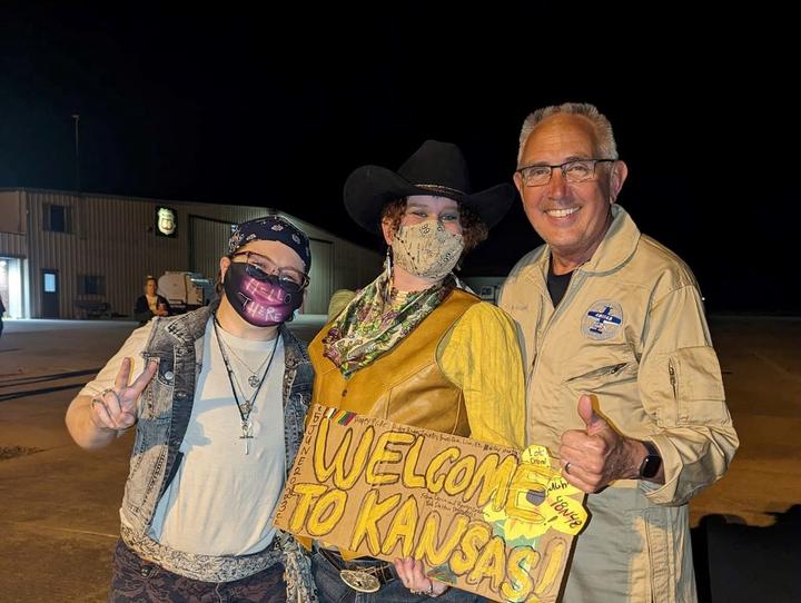 Delta pilot Barry Behnfeldt greets fans in Coffeyville, Kansas during his Guinness World Record attempt at flying through 48 states in 48 hours.