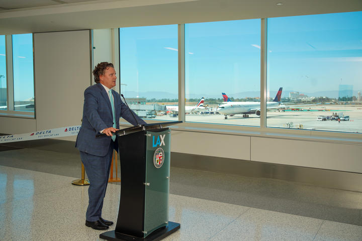 Scott Santoro, Delta's V.P. of Global Sales, speaks at the unveiling of the final major phase of the Delta Sky Way at LAX project.