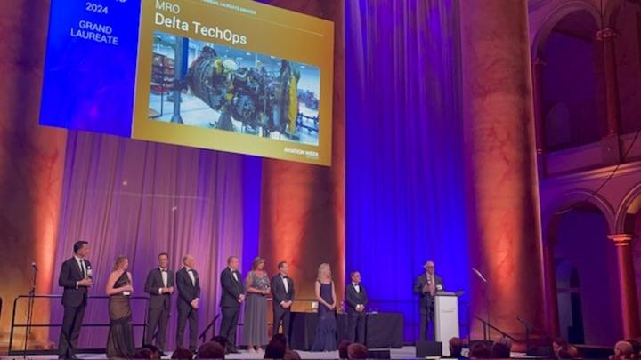 A photo of Delta TechOps being honored with a 2024 Grand Laureate Award by Aviation Week Network at their 66th Annual Laureate Awards ceremony. 