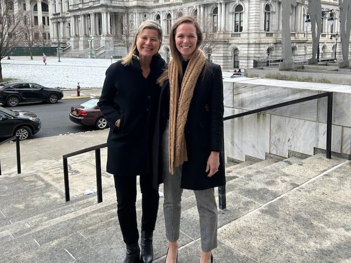 Delta Chief Sustainability Officer Amelia DeLuca (right) with Patricia Ornst, Managing Director - Government Affairs, outside the New York Capitol in Albany.