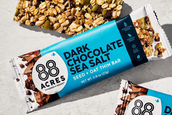 A photo of an on-board Delta snack, a soft-baked 88 Acres Dark Chocolate Sea Salt bar