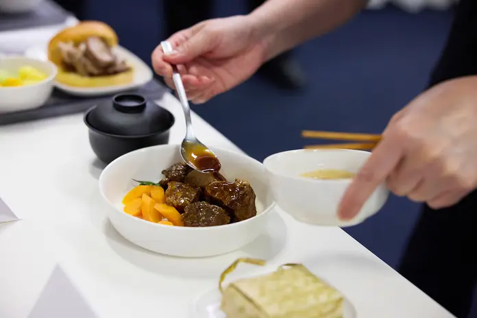 Chef Jereme Leung prepares Asian classics for Delta One service