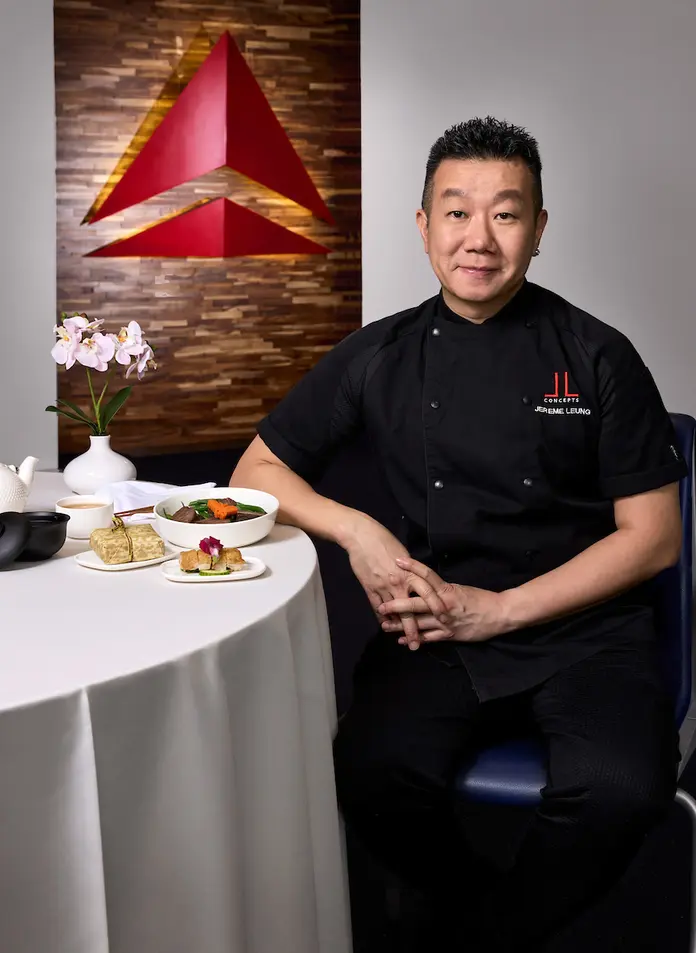 Global restaurateur and pioneering chef Jereme Leung stands in front of the Delta widget.