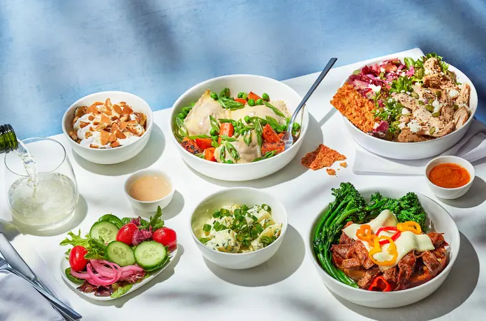 A flatlay of food available to Delta First Class customers departing from Atlanta, available beginning June 2024.