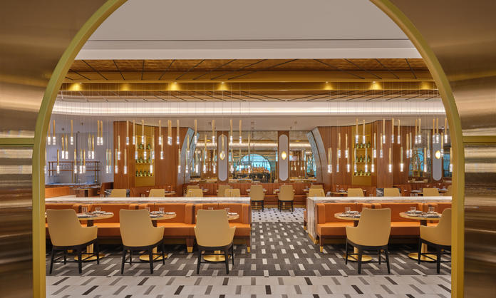 The iconic overlapping strands of the Brooklyn Bridge provided inspiration for the suspended lighting fixture in the dining room at The Delta Lounge-JFK.