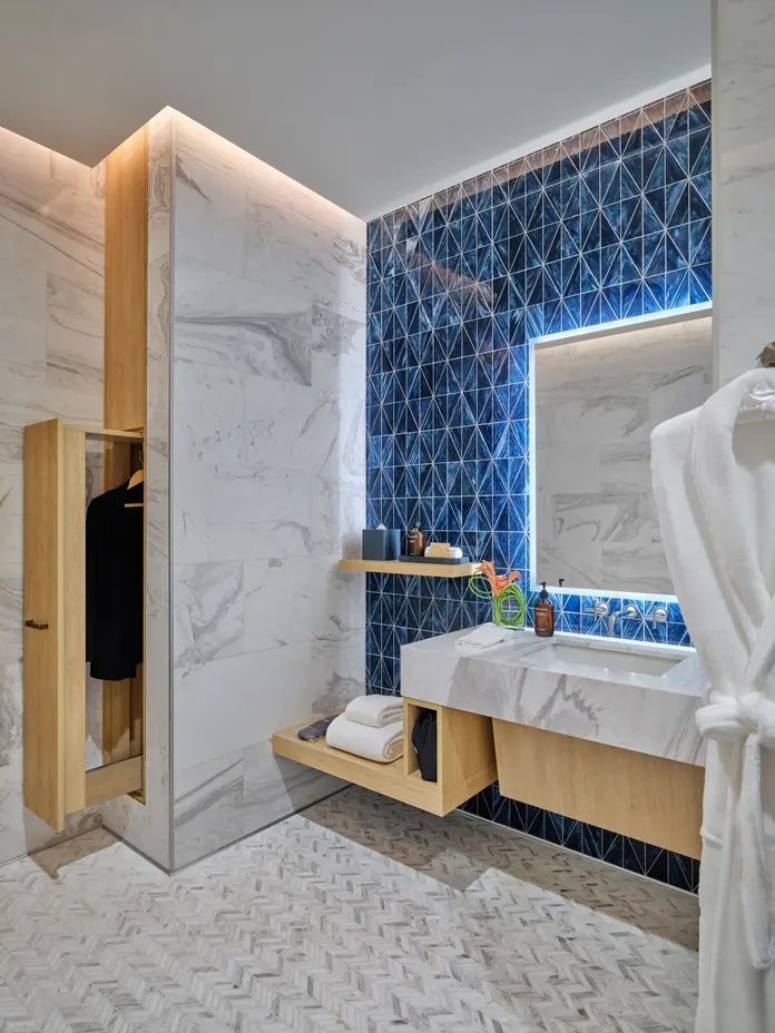 Guests at The Delta Lounge-JFK can freshen up at one of eight well-appointed shower suites, featuring towels, bathrobes and slippers, Grown Alchemist products, and more.&nbsp;