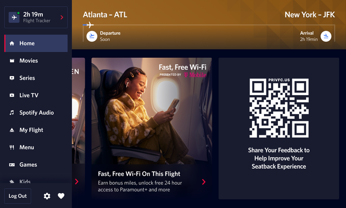 A seatback screen shows a QR code that gives customers the ability to give in-flight customer feedback.