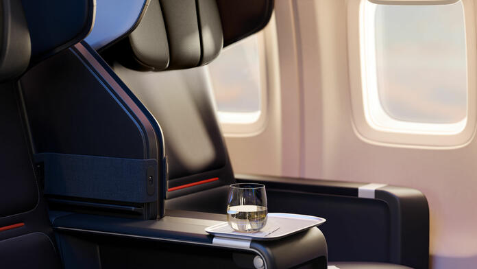 Updated seating for Delta Premium Select and First Class includes a new seat cover over memory foam cushions, complete with breathable engineered leather. 