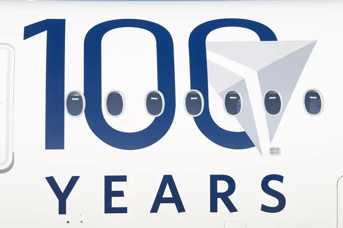 Delta's Centennial livery features a bold 100 emblem.