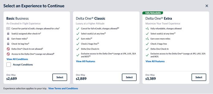 Delta booking screen comparing Basic Business, Delta One Classic and Delta One Extra fare options, including benefits and pricing.