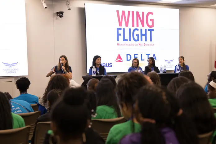 Students attend a WING Flight panel discussion featuring aviation professionals at the Airbus facility during Girls in Aviation Day.