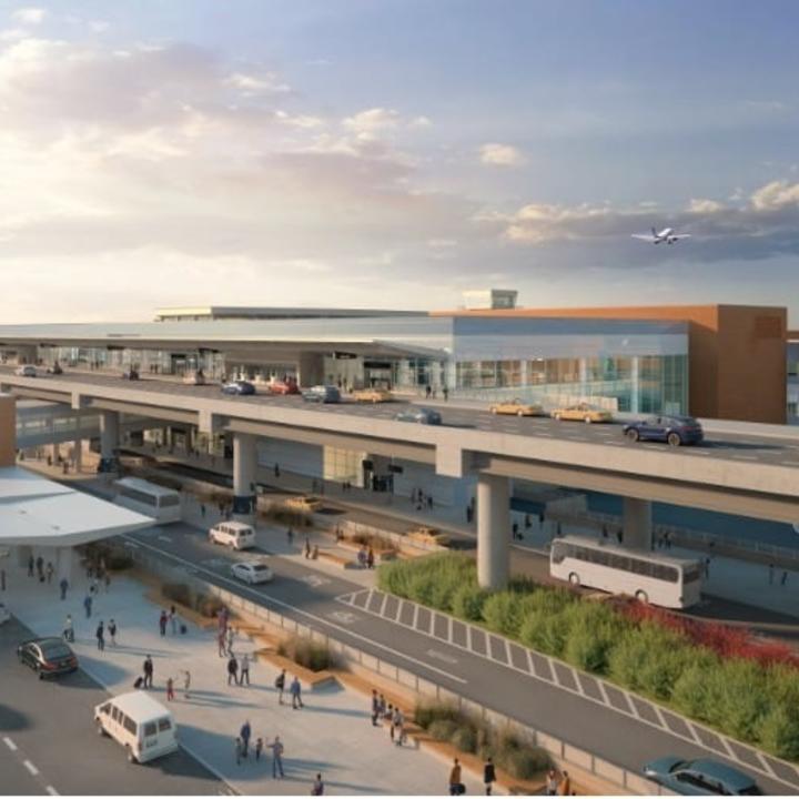 Wide shot of new SLC airport with beautiful sky in background