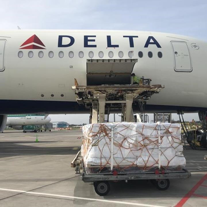 Shipments are loaded onto a Delta Cargo plane.