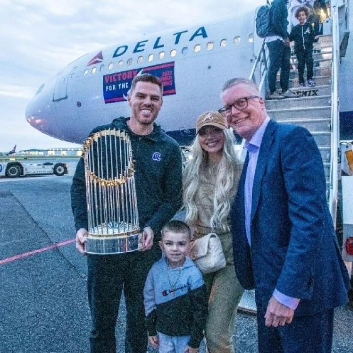 Ed poses with Freddie Freeman and his family.