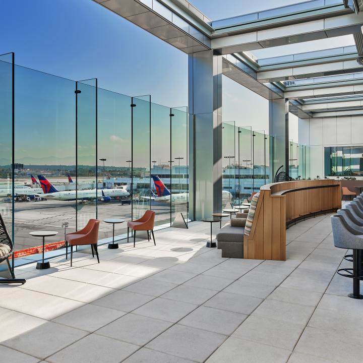 The crown jewel of the Club is the Sky Deck, a year-round, all-weather terrace where guests can enjoy drinks from the premium bar and panoramic views of downtown Los Angeles and the Hollywood Hills.