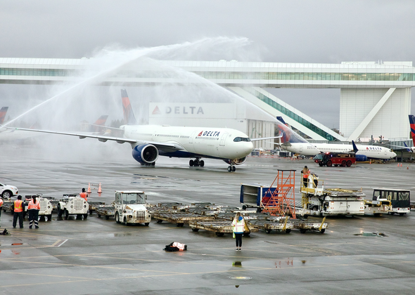 https://news.delta.com/sites/default/files/styles/crop_article_feature_image_2x_crop/public/2022-04/sea_iaf_water_salute.png?itok=NraSWEX4