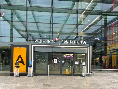 Entrance to Terminal 3 at Heathrow Airport with Virgin Atlantic and Delta logos