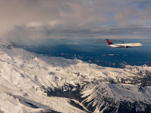 A Boeing 767-300 in-flight near Mount Rainier, Seattle, Washington
