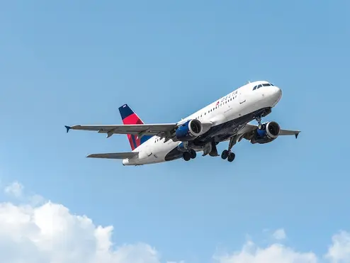 Delta Airbus 319-100 in flight