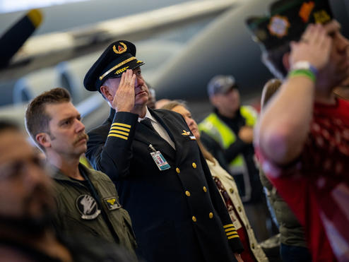 A Delta pilot salutes during the veterans appreciation event on Nov. 4, 2022.