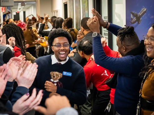 A student of Delta's new Business Class Program is welcomed at the Delta World Headquarters in Atlanta.