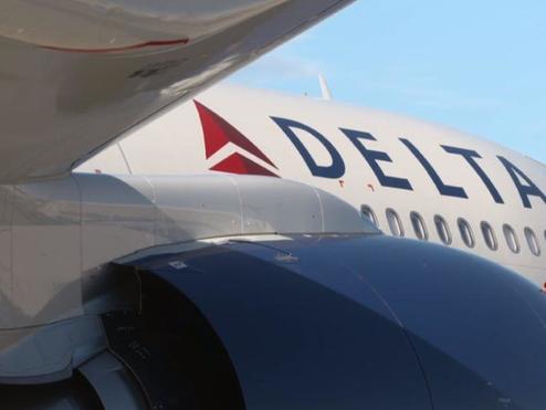 Side view of Delta A330-900 aircraft displaying Delta logo.