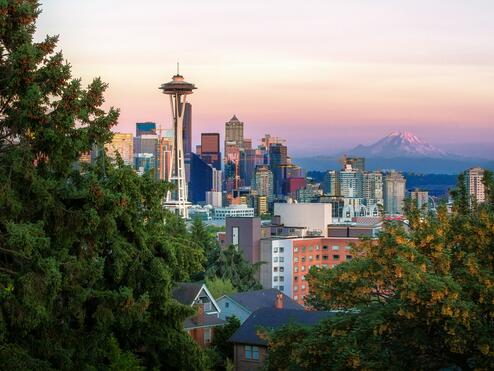 A view of the Seattle skyline featuring the Space Needle and Mt. Rainier