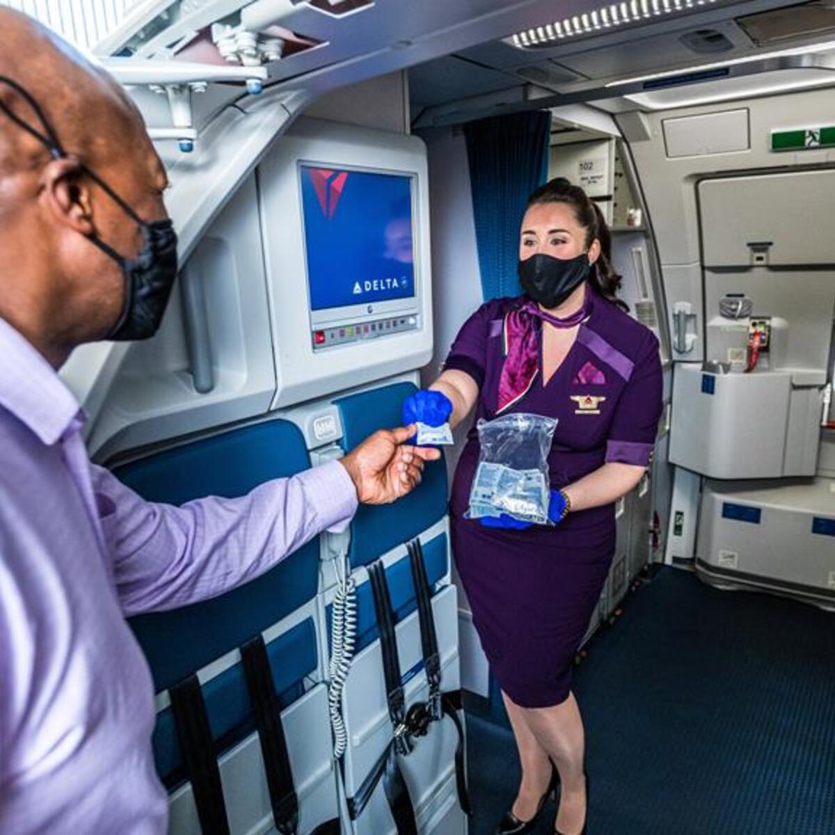 Delta hand sanitzer while boarding