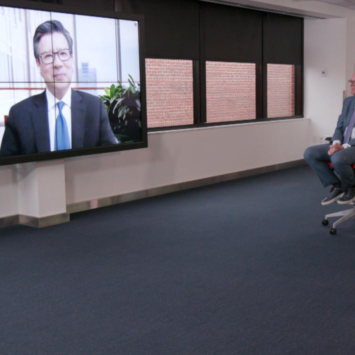 Delta CEO Ed Bastian conferencing with Chief Health Officer Dr. Henry Ting