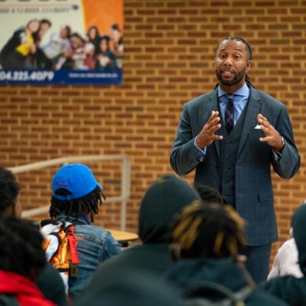 Larry Fitzgerald talks to students at South Atlanta High School