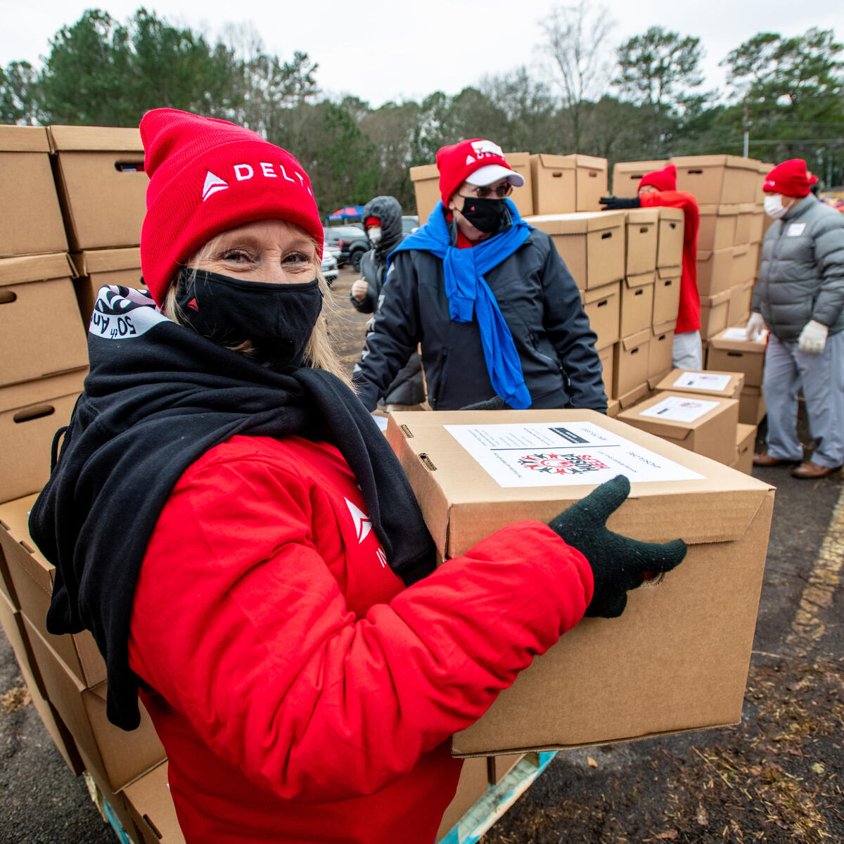 Delta employees volunteer at the recent Hosea Helps event.