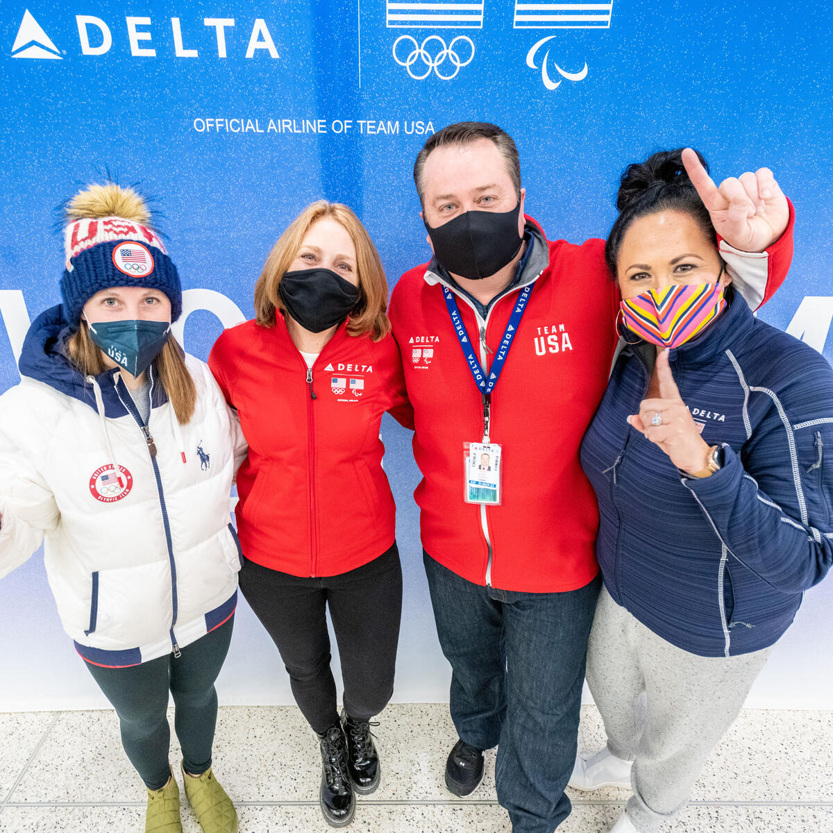 (From left to right) Nikki Leonard, fiancee of speedskater Ryan Pivorotto, Kris, a Delta Air Lines flight attendant and Nikki's mother, Scott, a Delta Air Lines First Officer and uncle of pairs figureskater Brandon Frazier, and Heather, wife of Scott