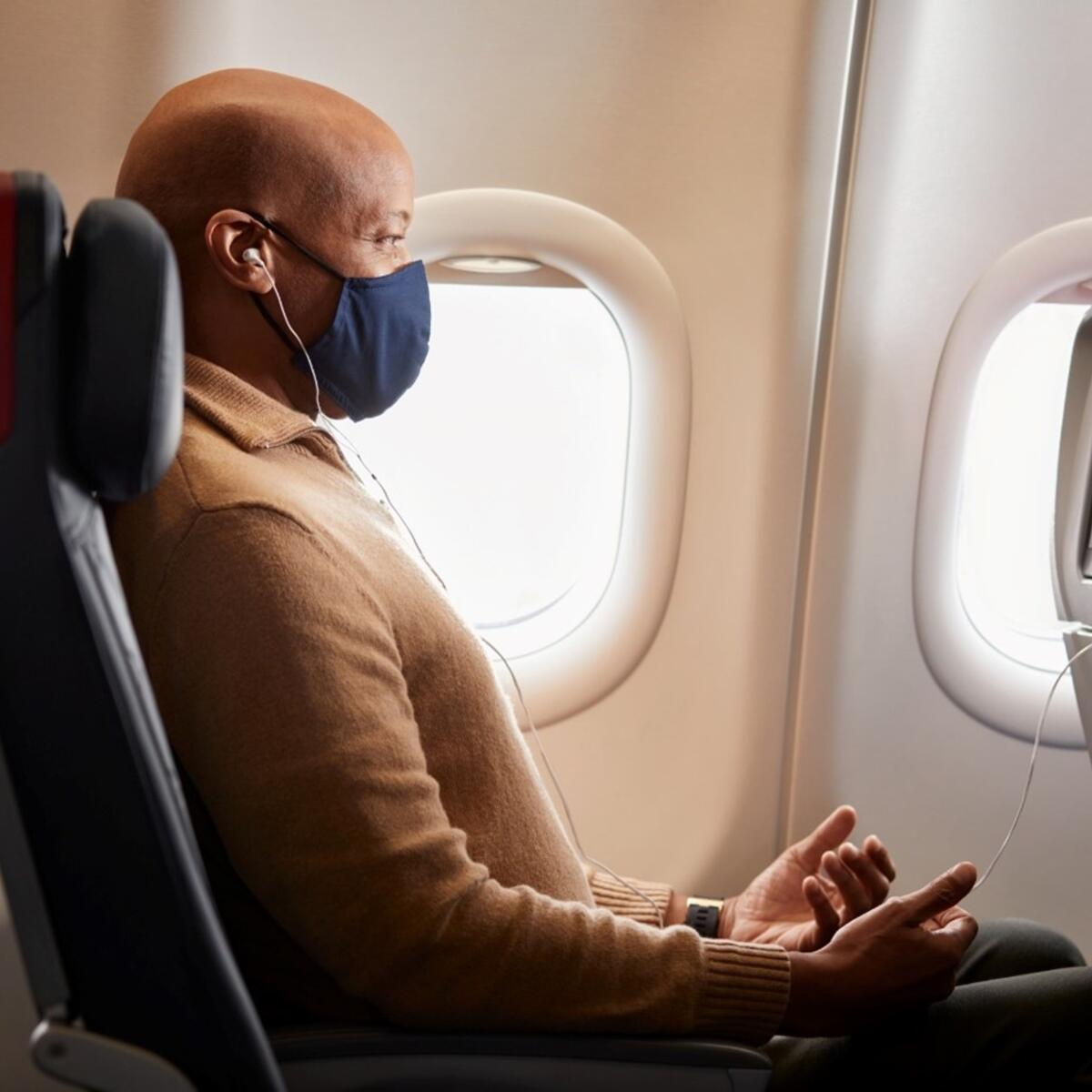 A customer enjoys some of Delta's in-flight wellness offerings.