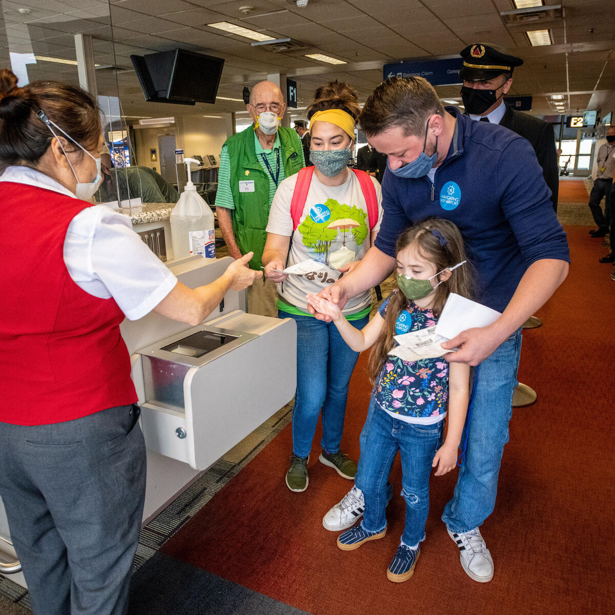 Customers and their children get the opportunity to practice the ticketing process during the Navigating MSP program.