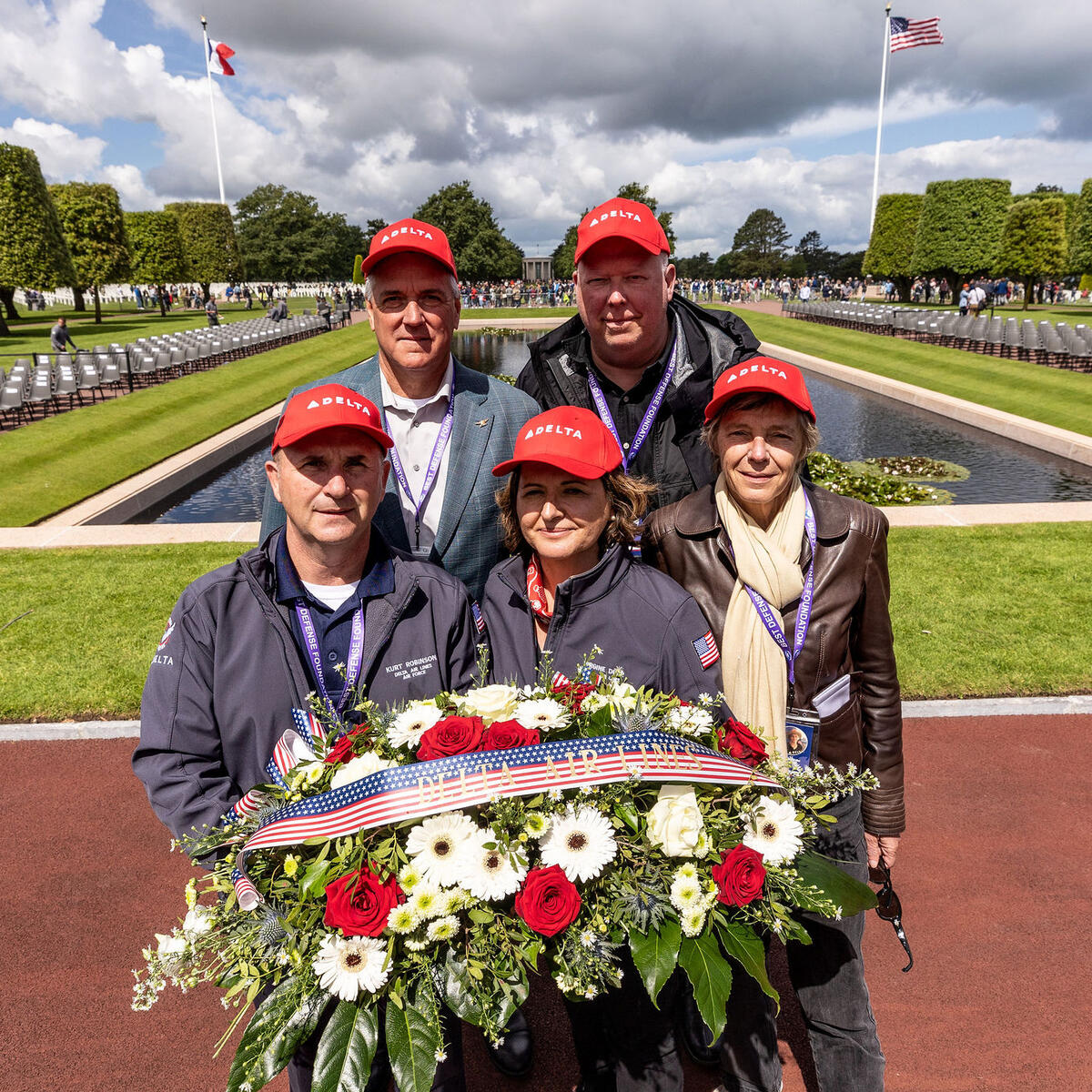 Delta’s Kurt Robinson, Virginie Durr, Beatrice deRotalier, Chris Jones and Paul Hassenstab at Normandy American Cemetery and Memorial on D-Day.