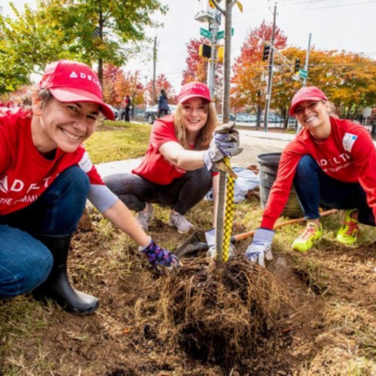 Delta volunteers planting trees