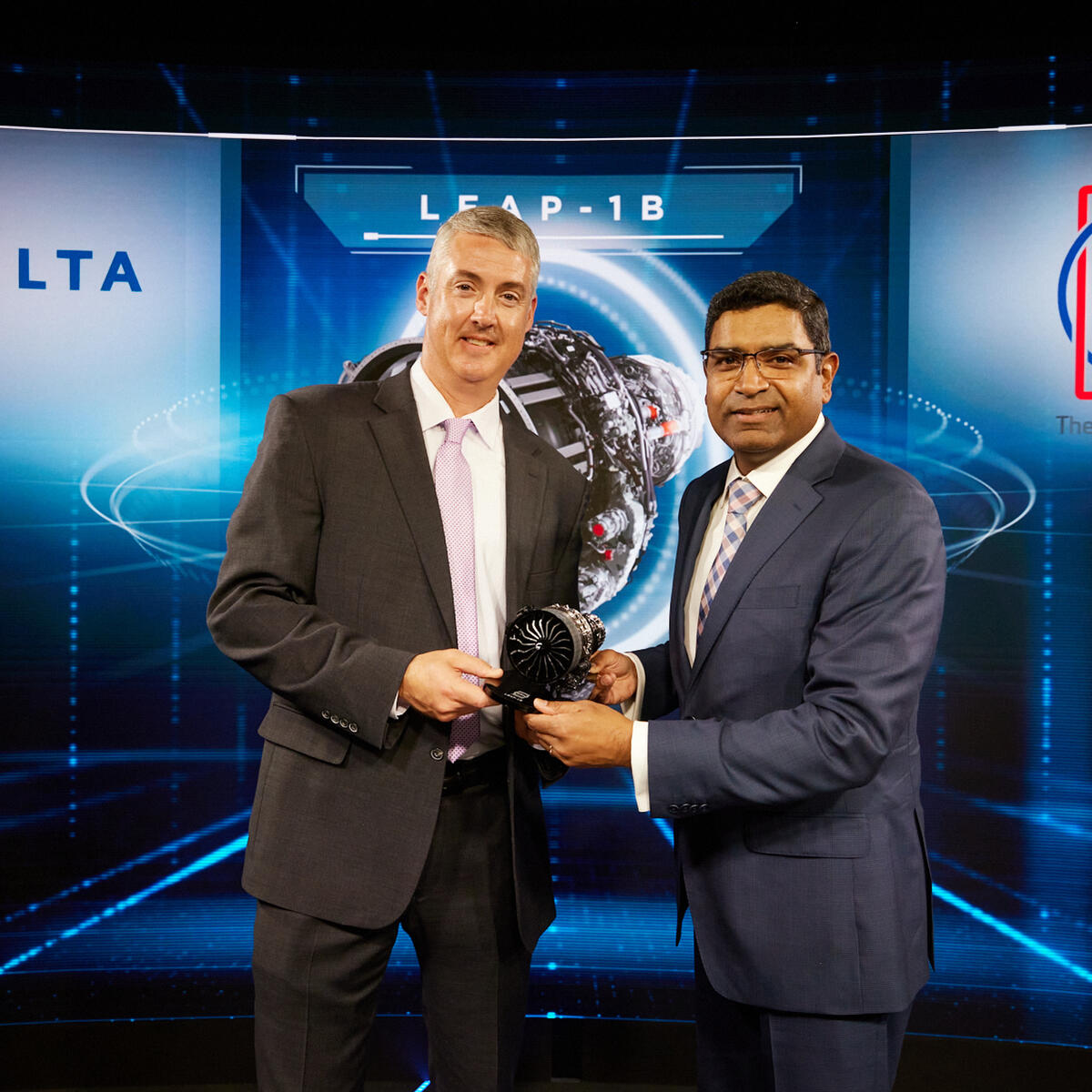 Delta Senior Vice President of Fleet & TechOps Supply Chain Mahendra Nair (right) and Vice President, Aftermarket Strategic Solutions, for CFM International Tom Levin at the Farnborough International Air Show.