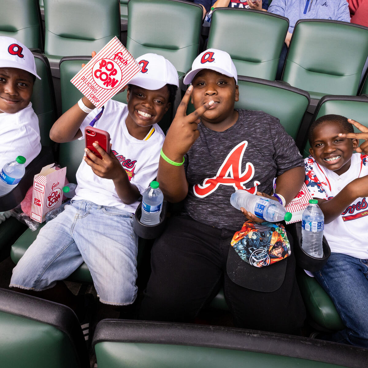 Four children at Atlanta Braves game