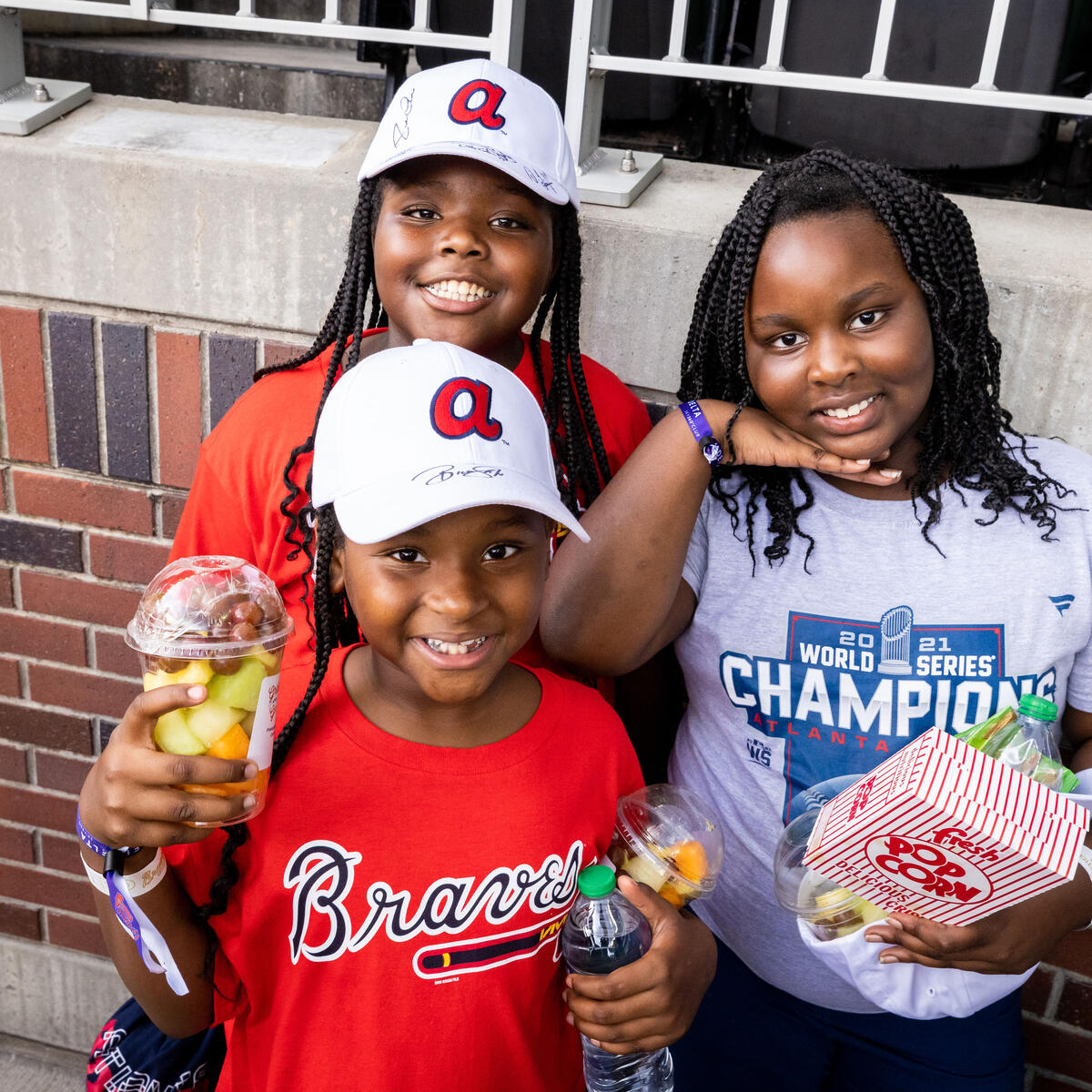 Three children at Atlanta Braves game