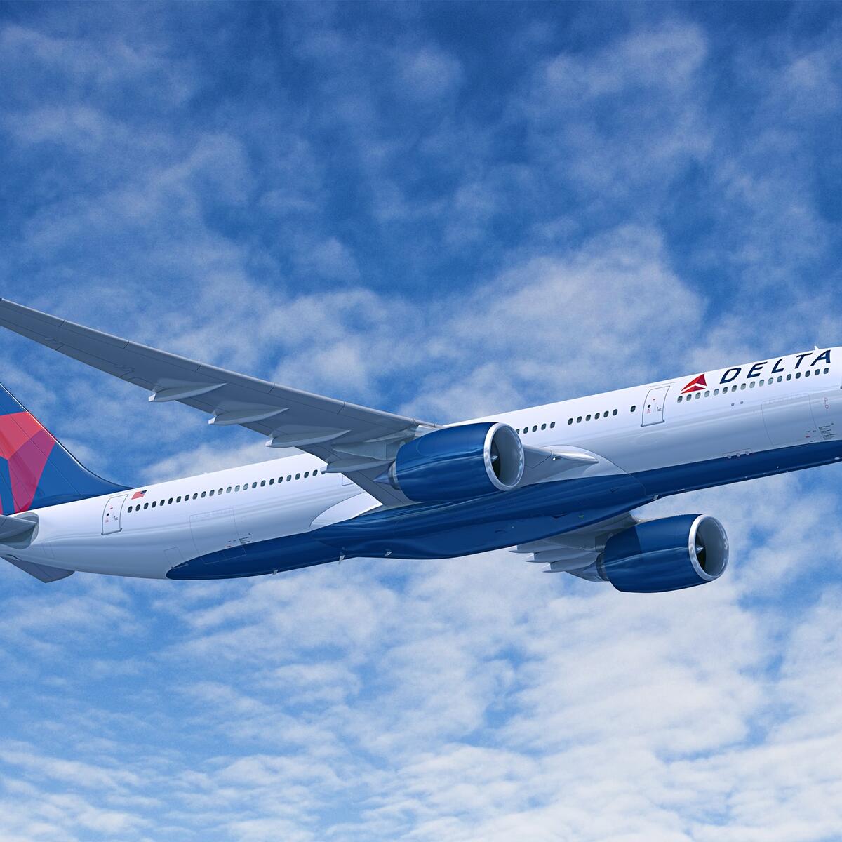 A330-900 aircraft flying with blue skies