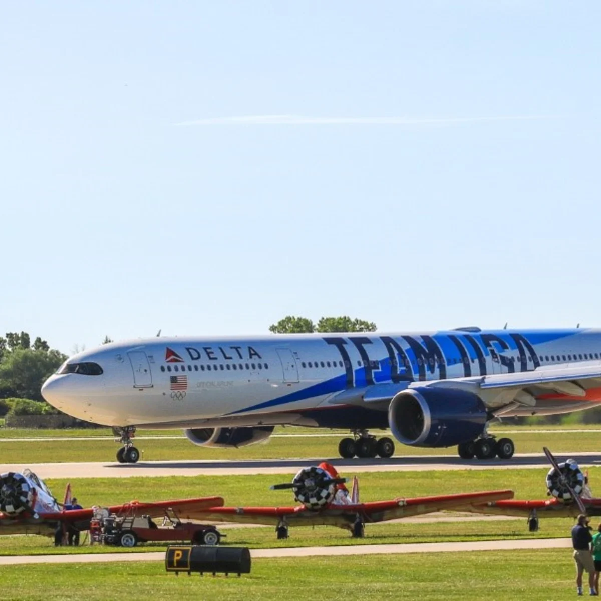 narrow horizontal photo of Team USA plane