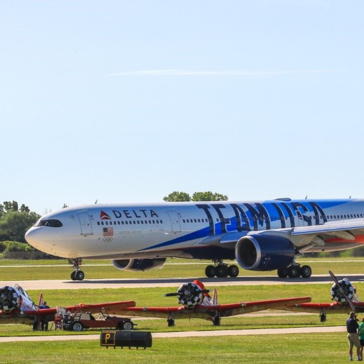 narrow horizontal photo of Team USA plane