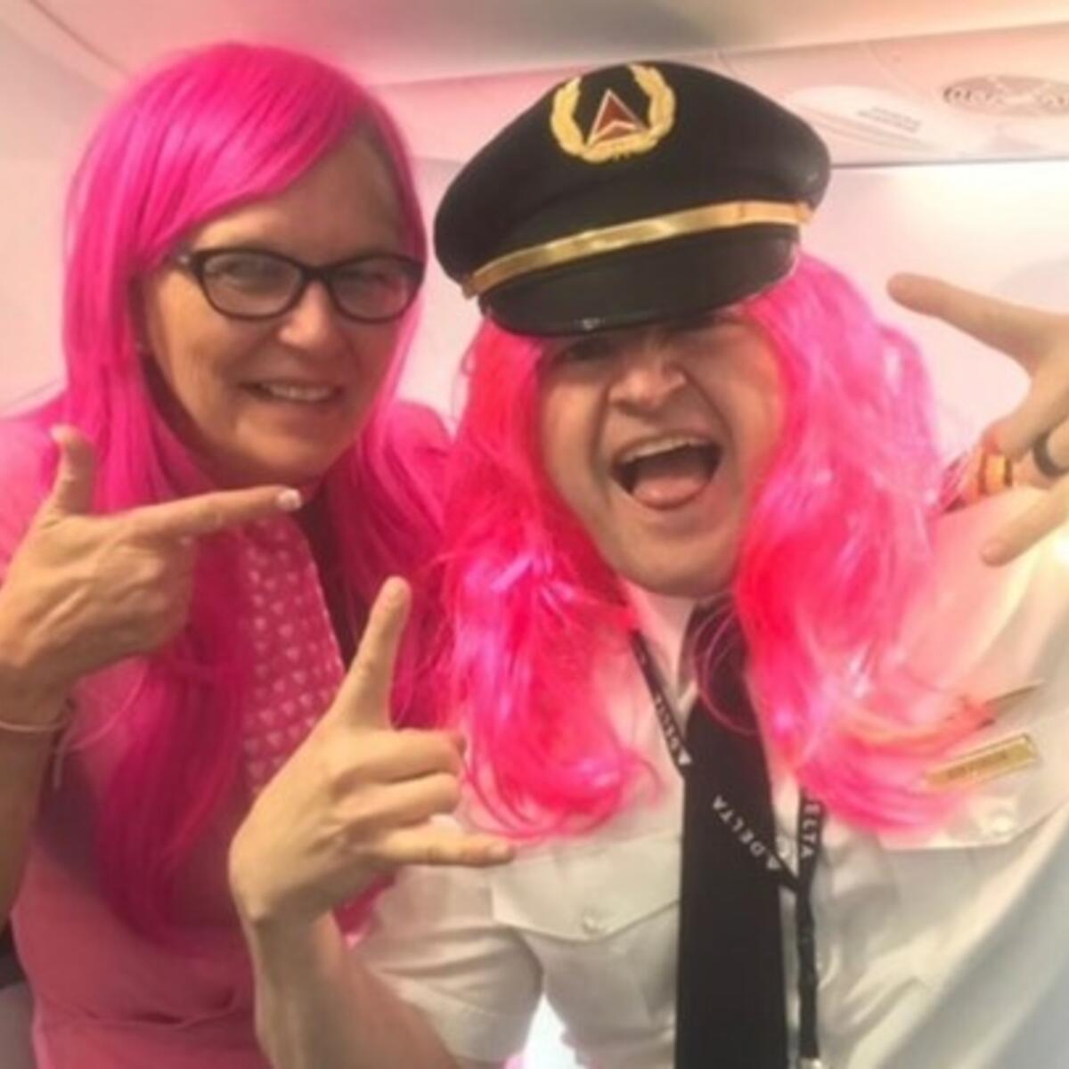 Flight attendant Robin Schmidt is pictured with one of her Delta colleagues.