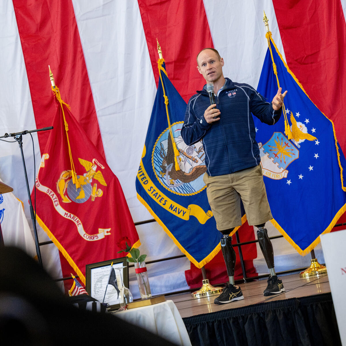 Navy SEAL lieutenant commander and Team USA Paralympian Dan Cnossen speaks at the 2022 veterans appreciation event.