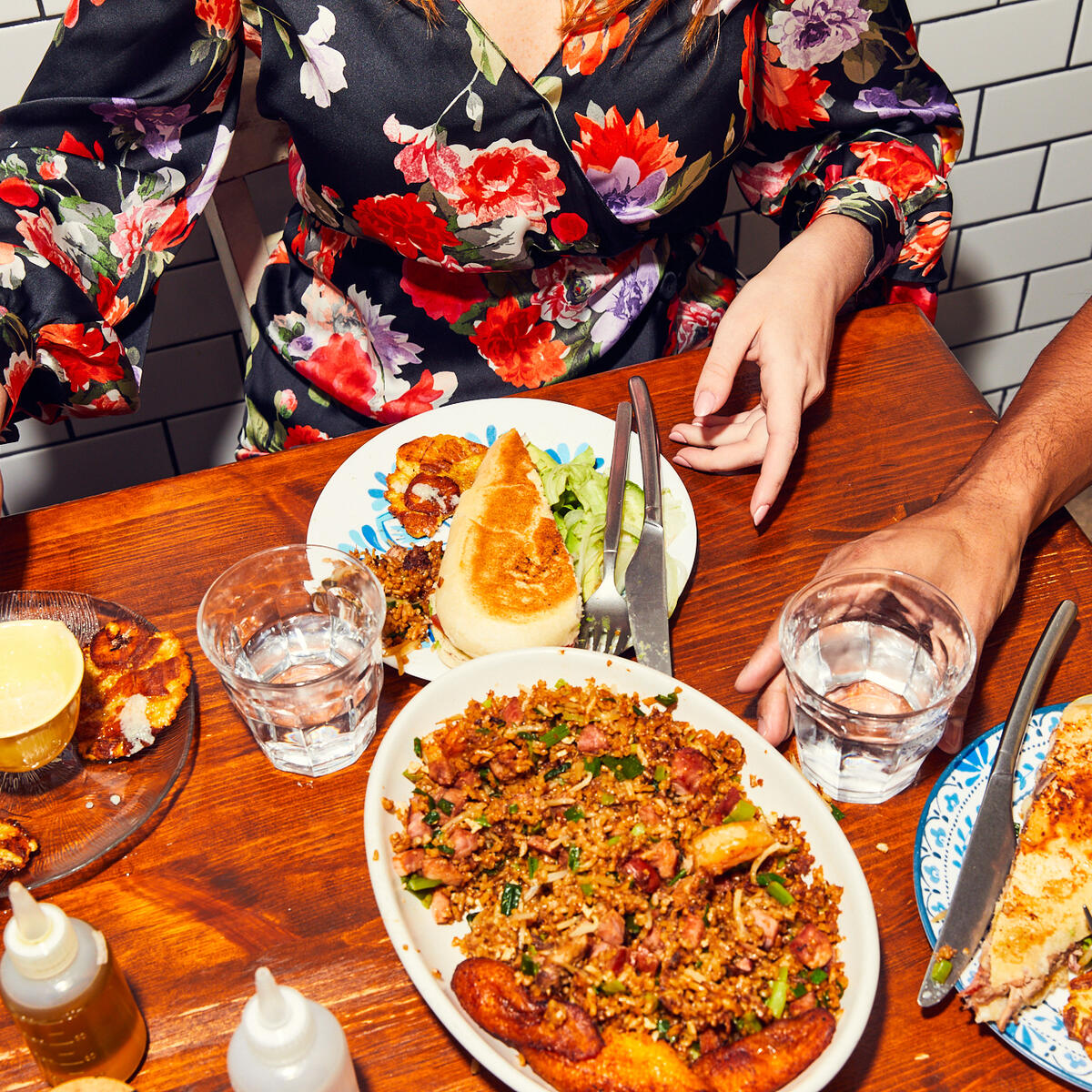 People dine at a table.